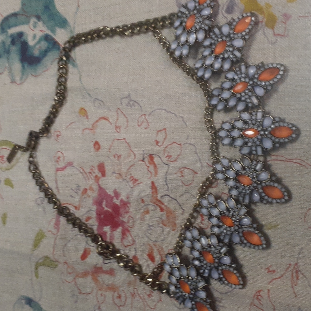 Baublebar necklace with blue and orange stones.